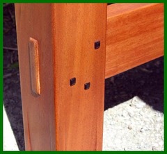 Detail through-tenon construction and square Ebony pegs.